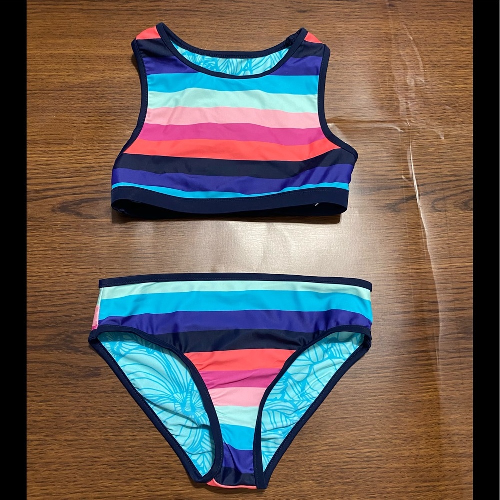 Youth Girls Reversible 2 Piece Swimsuit size S 7/8. In like new condition.